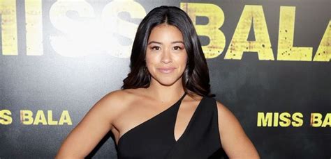 gina rodriguez sexy|Gina Rodriguez sizzles in skimpy string bikini on 33rd。